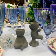 Подсвечник гипсовый Малыш сидит серый - фото 66987